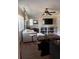 Cozy living room with modern decor, wood flooring, and a comfortable seating area at 11107 Riverview Dr, Riverview, FL 33578