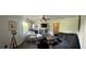 Open-concept living room featuring modern furnishings, wood floors and a comfortable seating area at 11107 Riverview Dr, Riverview, FL 33578