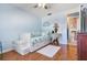 This bedroom offers natural light from the window, and features a white daybed at 11296 90Th Ave, Seminole, FL 33772