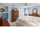 Bright bedroom with white closet doors and wooden furniture at 11296 90Th Ave, Seminole, FL 33772