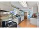 Kitchen with stainless steel appliances, white cabinets, and decorative details at 11296 90Th Ave, Seminole, FL 33772