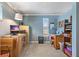This office space includes a desk, storage cabinets, and a window at 11296 90Th Ave, Seminole, FL 33772