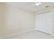 Bedroom with a ceiling fan, closet, and tiled floor at 11627 Ivy Flower Loop, Riverview, FL 33578