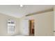 Bright bedroom featuring a ceiling fan, and white tile flooring at 11627 Ivy Flower Loop, Riverview, FL 33578