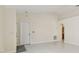 Open-concept living area with tile flooring and a doorway view of an adjacent room at 11627 Ivy Flower Loop, Riverview, FL 33578