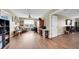 Bonus room featuring wood floor, ceiling fan, and large windows at 11904 Greenchop Pl, Riverview, FL 33579