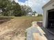 Expansive backyard with mature trees and well-maintained landscaping at 12021 Club House Rd, Brooksville, FL 34613