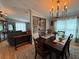 Elegant dining room features a stylish table set for a meal and modern decor at 12021 Club House Rd, Brooksville, FL 34613