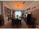 Charming dining area with a table, stylish decor, and bar area for entertaining at 12021 Club House Rd, Brooksville, FL 34613