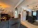 Comfortable living room featuring neutral tones and access to other areas of the home at 12021 Club House Rd, Brooksville, FL 34613