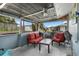 Inviting screened patio featuring an outdoor living space at 1205 Desert Hills Dr, Sun City Center, FL 33573