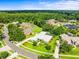 Spacious home in a lush, mature neighborhood; aerial view shows the roofline and beautiful location of this property at 13608 Lytton Way, Tampa, FL 33624
