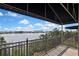 Balcony view with a beautiful river and palm trees, blue skies, and black awning at 1402 Harbour Walk Rd, Tampa, FL 33602