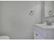 Bright bathroom featuring a sleek white vanity and modern fixtures at 1402 Harbour Walk Rd, Tampa, FL 33602