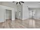 Bedroom with hardwood floors, plantation shutters and walk-in closet at 1402 Harbour Walk Rd, Tampa, FL 33602