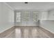 Bright bonus room filled with natural light and shuttered windows at 1402 Harbour Walk Rd, Tampa, FL 33602
