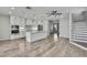 Modern kitchen boasts sleek white cabinets and stainless steel appliances at 1402 Harbour Walk Rd, Tampa, FL 33602