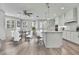 Bright kitchen with hardwood floors and an adjoining dining area at 1402 Harbour Walk Rd, Tampa, FL 33602