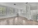 Bright and spacious living room with hardwood floors and modern lighting at 1402 Harbour Walk Rd, Tampa, FL 33602