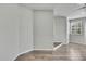 Bright living room with hardwood floors and white plantation shutters at 1402 Harbour Walk Rd, Tampa, FL 33602