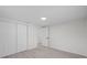 Bedroom with double door closet, and light floors at 15025 Shark St, Hudson, FL 34667