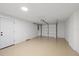 Spacious garage with an automatic door and side entrance, offering ample parking and storage at 15025 Shark St, Hudson, FL 34667