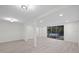 Spacious living room with pool access and recessed lighting throughout at 15025 Shark St, Hudson, FL 34667