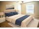 Bedroom featuring a plush bed with white linens and a large window at 15709 Demory Point Pl, Ruskin, FL 33573