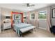 Cozy bedroom featuring a Murphy bed, neutral tones, and plenty of natural light at 1709 Main St, Safety Harbor, FL 34695