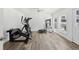 Bright exercise room with wood floors, natural light, and workout equipment at 1709 Main St, Safety Harbor, FL 34695