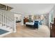 Bright living room featuring hardwood floors, stylish furniture, and an open concept design with natural light at 1709 Main St, Safety Harbor, FL 34695