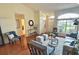 Comfortable living room featuring a neutral color palette, ample natural light, and stylish furniture at 18531 Bent Pine Dr, Hudson, FL 34667