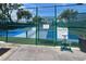 Well-maintained pickleball court with clear signage and safety features for active community members at 18531 Bent Pine Dr, Hudson, FL 34667
