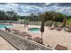 Resort-style pool and spa area with lounge chairs and scenic views, perfect for relaxation at 18531 Bent Pine Dr, Hudson, FL 34667
