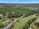 Aerial view of the property highlighting the golf course and surrounding greenery at 190 Dale Pl, Oldsmar, FL 34677