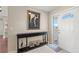 Welcoming entryway featuring a console table, decorative accents, and a bright front door at 190 Dale Pl, Oldsmar, FL 34677