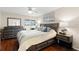 The main bedroom includes a ceiling fan, an ensuite bathroom, and access to a private lanai at 190 Dale Pl, Oldsmar, FL 34677