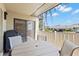 Relaxing outdoor patio with seating area and grill, perfect for enjoying the weather at 190 Dale Pl, Oldsmar, FL 34677