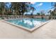 Community pool features plenty of seating and a calming, reflective surface at 190 Dale Pl, Oldsmar, FL 34677