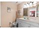 Bathroom featuring a shower, vanity, and marble countertops at 2214 Highclere Cir # 6, Sun City Center, FL 33573