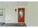 Inviting front door with a stained-glass oval window and matching side door at 2214 Highclere Cir # 6, Sun City Center, FL 33573