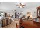 Open living area with ceiling fans, comfortable seating, and open floorplan at 2214 Highclere Cir # 6, Sun City Center, FL 33573