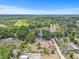Aerial perspective of the property with surrounding natural landscape and water features at 2233 Rightaway Ln, Plant City, FL 33565