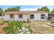 Charming single-story home featuring desert landscaping and a well-maintained exterior at 2233 Rightaway Ln, Plant City, FL 33565