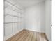 Empty walk-in closet with wire shelving provides ample storage space at 2233 Rightaway Ln, Plant City, FL 33565