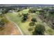 Scenic aerial view of a meticulously manicured golf course surrounded by lush greenery at 2238 Lark W Cir # D, Palm Harbor, FL 34684