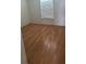 Empty bedroom showing flooring and a bright window with blinds at 2603 Mary Sue Sw St, Largo, FL 33774