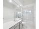 Bathroom featuring a vanity sink, mirror, toilet, and shower/tub combo with sliding glass doors at 2730 River Woods Dr, Parrish, FL 34219