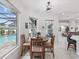 Bright breakfast nook with views of the pool, offering a cozy spot for casual dining at 2730 River Woods Dr, Parrish, FL 34219
