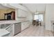 Open layout between kitchen, dining area, and living room, great for entertaining guests at 30445 Tremont Dr, Wesley Chapel, FL 33543